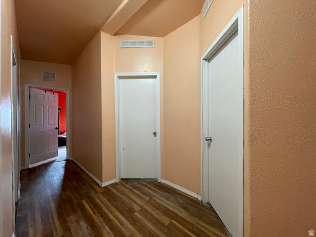 240 Horseshoe Bend Road Vernal, UT 84078 - Photo 18 of 41 Hall featuring baseboards and dark wood finished floors