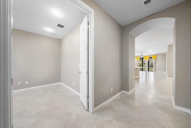 a view of a room with window and a balcony