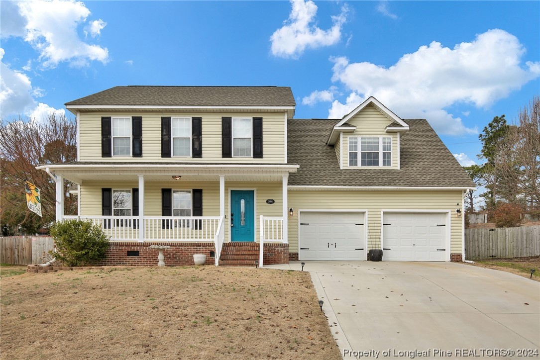 5808 Spreading Branch Road Hope Mills, NC 28348 - Photo 1 of 35 front view of a house with a yard