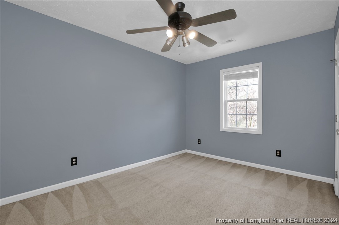 5808 Spreading Branch Road Hope Mills, NC 28348 - Photo 26 of 35 a view of an empty room with a window