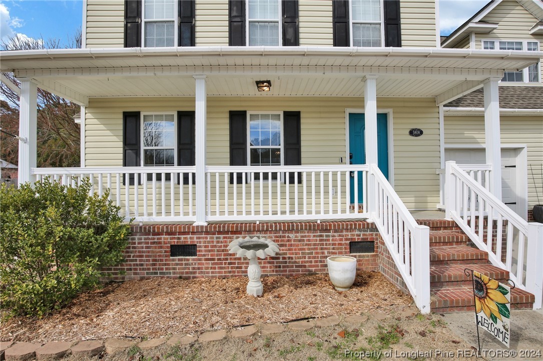 5808 Spreading Branch Road Hope Mills, NC 28348 - Photo 4 of 35 front view of a house with a porch