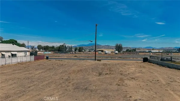 a view of a road with a big yard