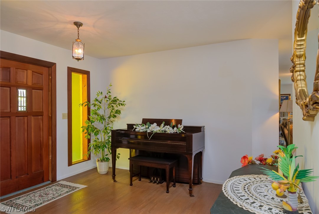 13970 Elkins Road Fort Myers, FL 33913 - Photo 4 of 35 a dining room with furniture and window