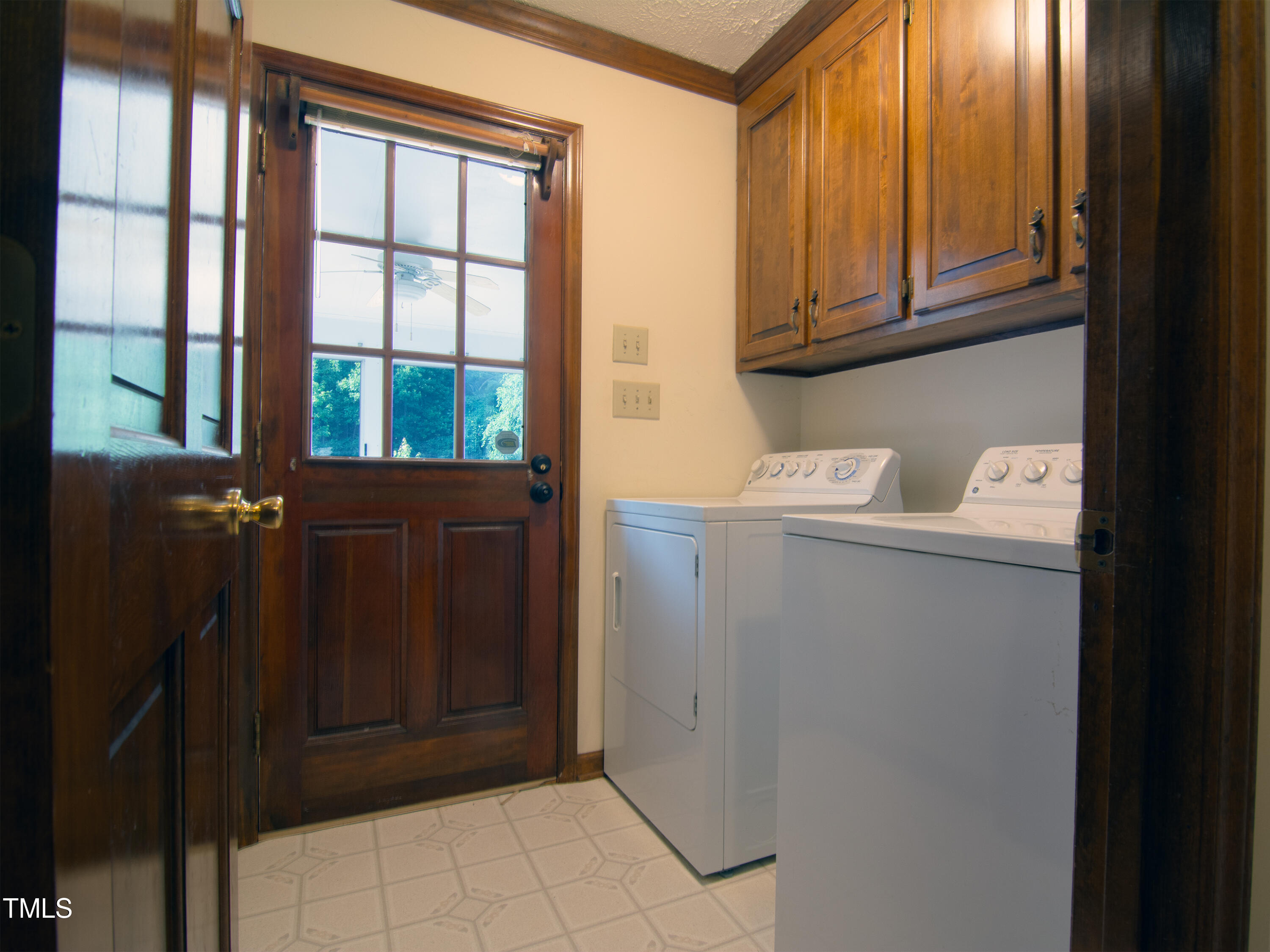 1356 Holeman Ashley Road Timberlake, NC 27583 - Photo 8 of 21 a utility room with dryer and washer