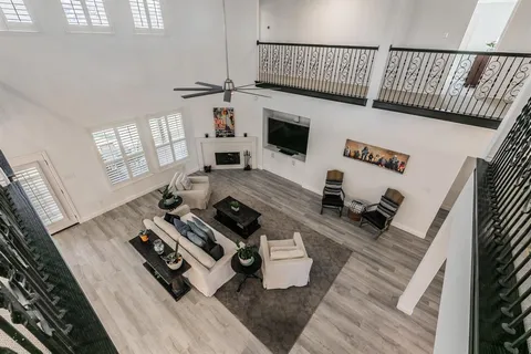 a living room with furniture and a window