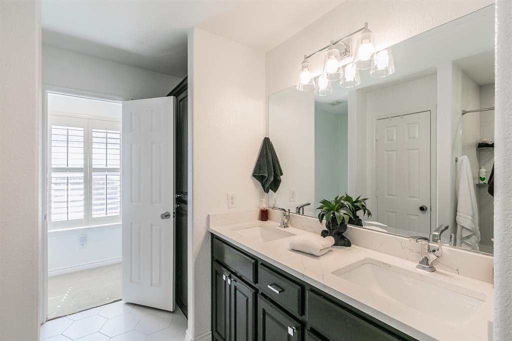 12548 Avondale Ridge Drive Fort Worth, TX 76179 - Photo 33 of 40 Full bath with double vanity and a sink