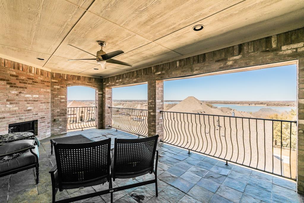 12548 Avondale Ridge Drive Fort Worth, TX 76179 - Photo 36 of 40 View from patio of the stunning lake and a fireplace to keep warm.