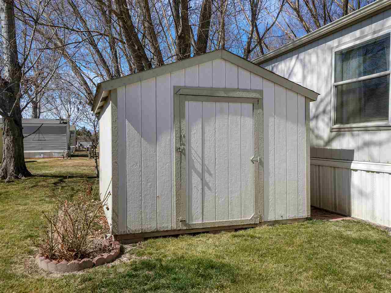 435 32 Road, Unit 705 Clifton, CO 81520 - Photo 16 of 16 a house with trees in front of it