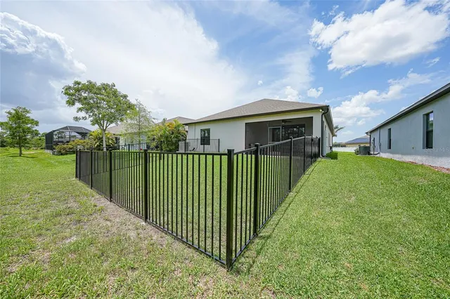 a view of a backyard with a garden