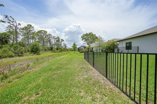 a view of a garden in front of a house