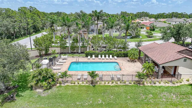 a front view of house with a garden
