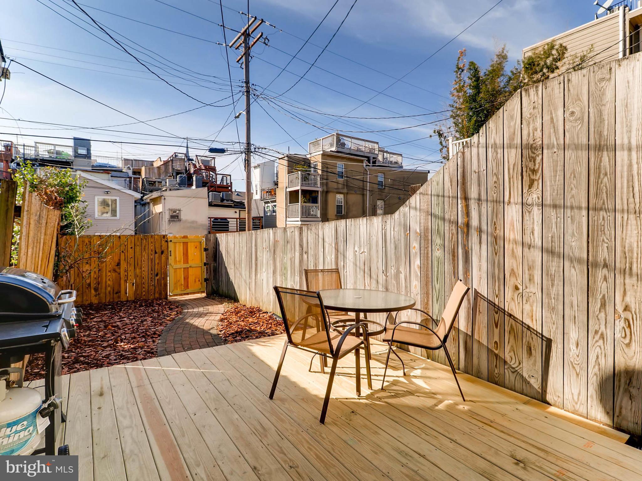 1212 Riverside Avenue Baltimore, MD 21230 - Photo 12 of 27 a view of outdoor space with wooden floor and outdoor seating