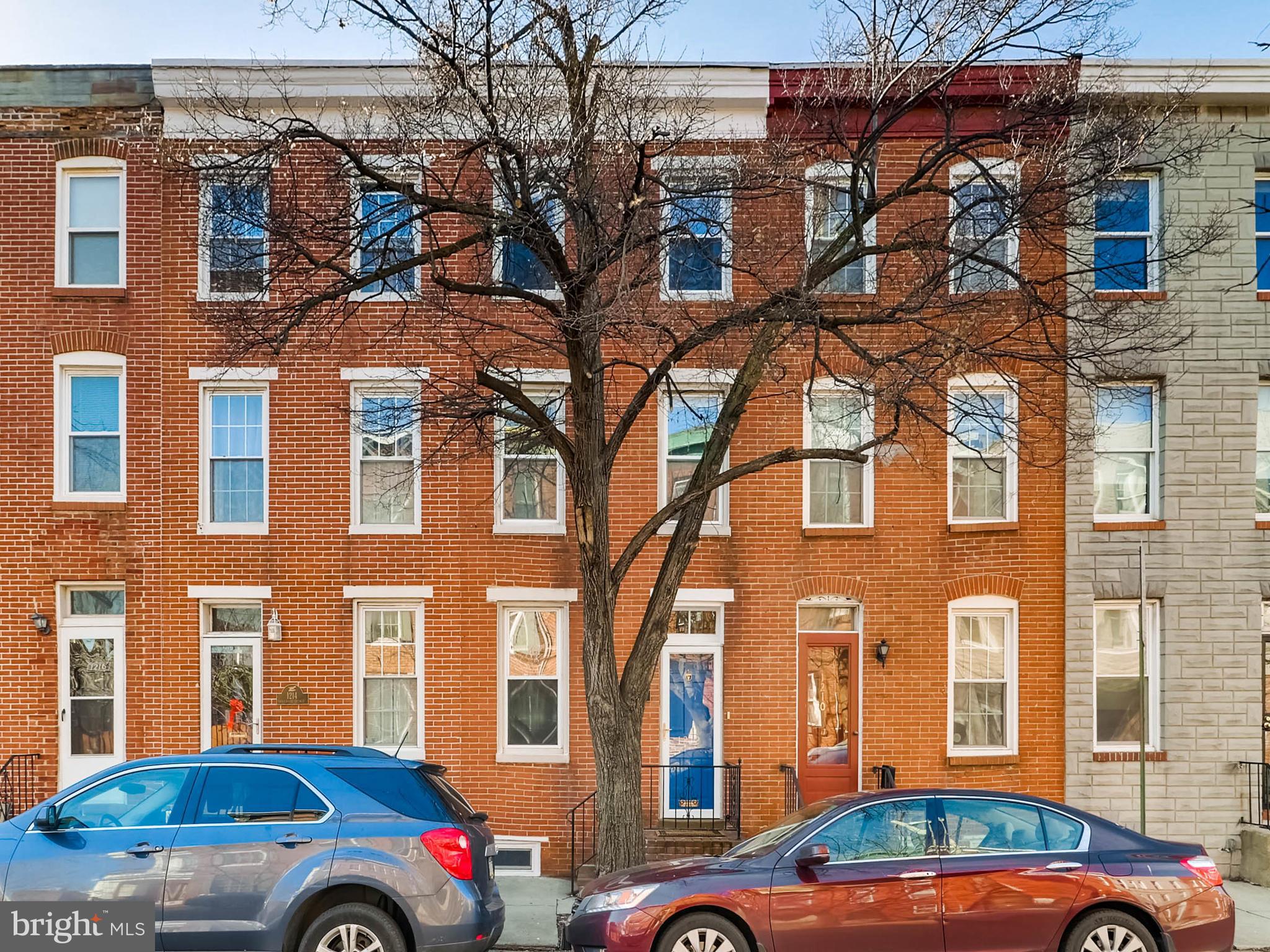 1212 Riverside Avenue Baltimore, MD 21230 - Photo 3 of 27 a front view of a building with parking space