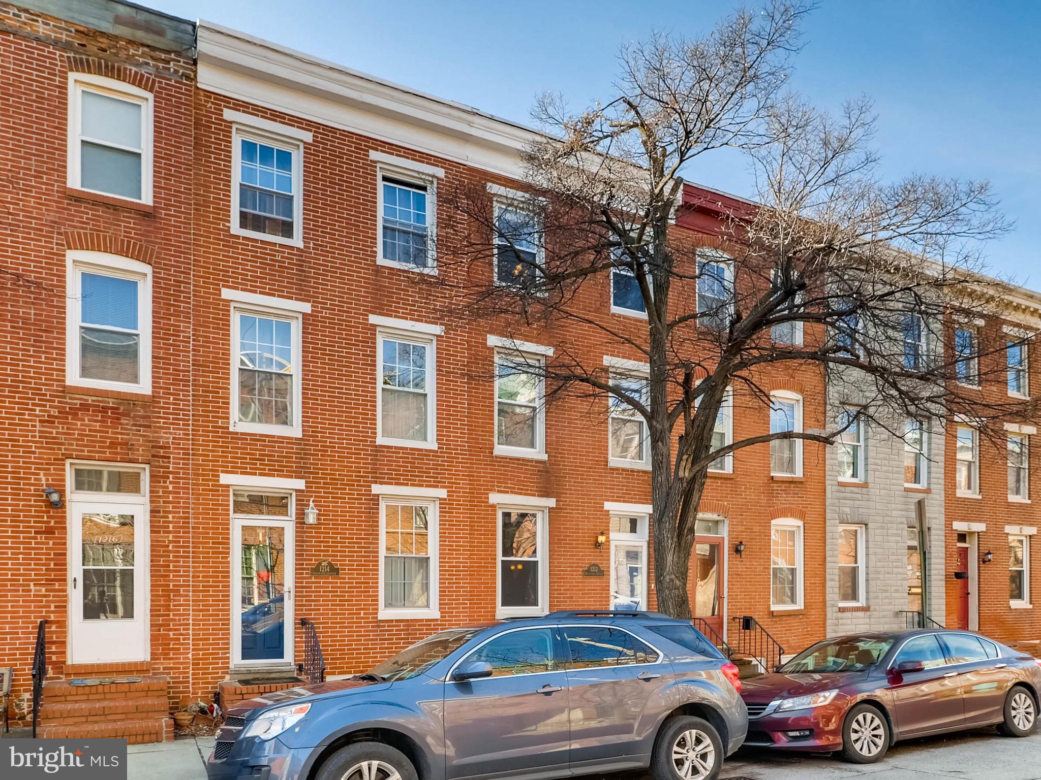 1212 Riverside Avenue Baltimore, MD 21230 - Photo 27 of 27 a front view of a building with parking space