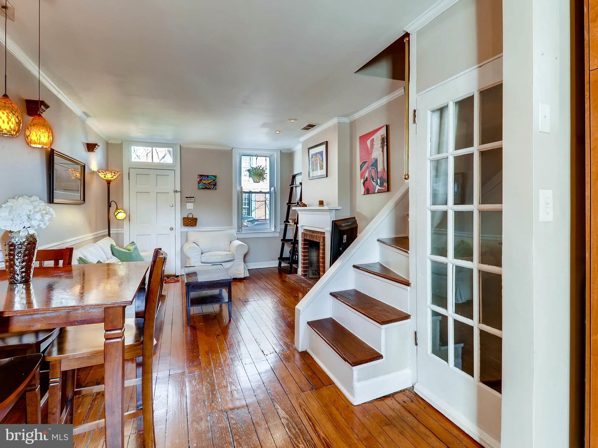 1212 Riverside Avenue Baltimore, MD 21230 - Photo 6 of 27 a living room with furniture and a wooden floor
