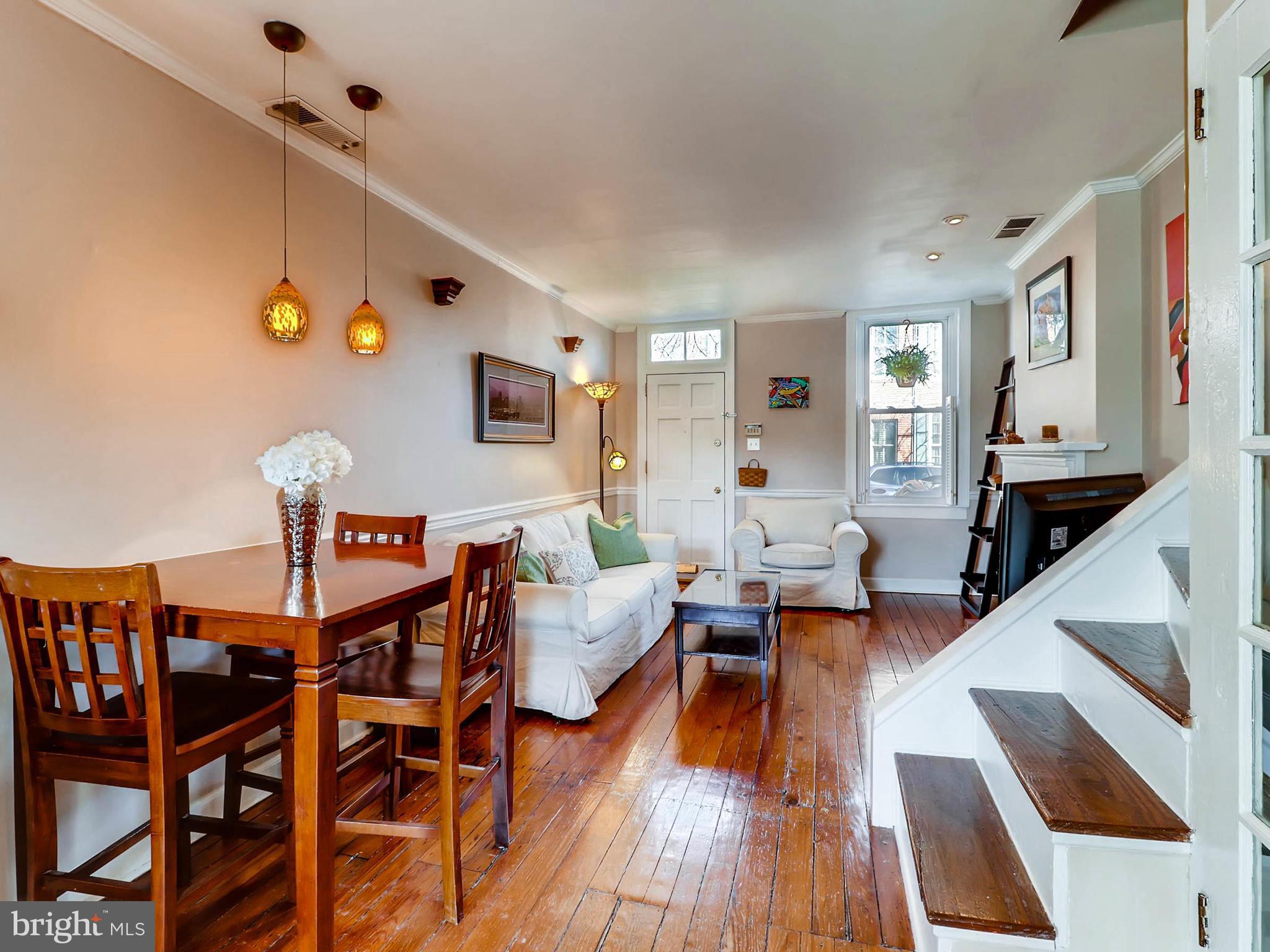 1212 Riverside Avenue Baltimore, MD 21230 - Photo 7 of 27 a living room with furniture and wooden floor