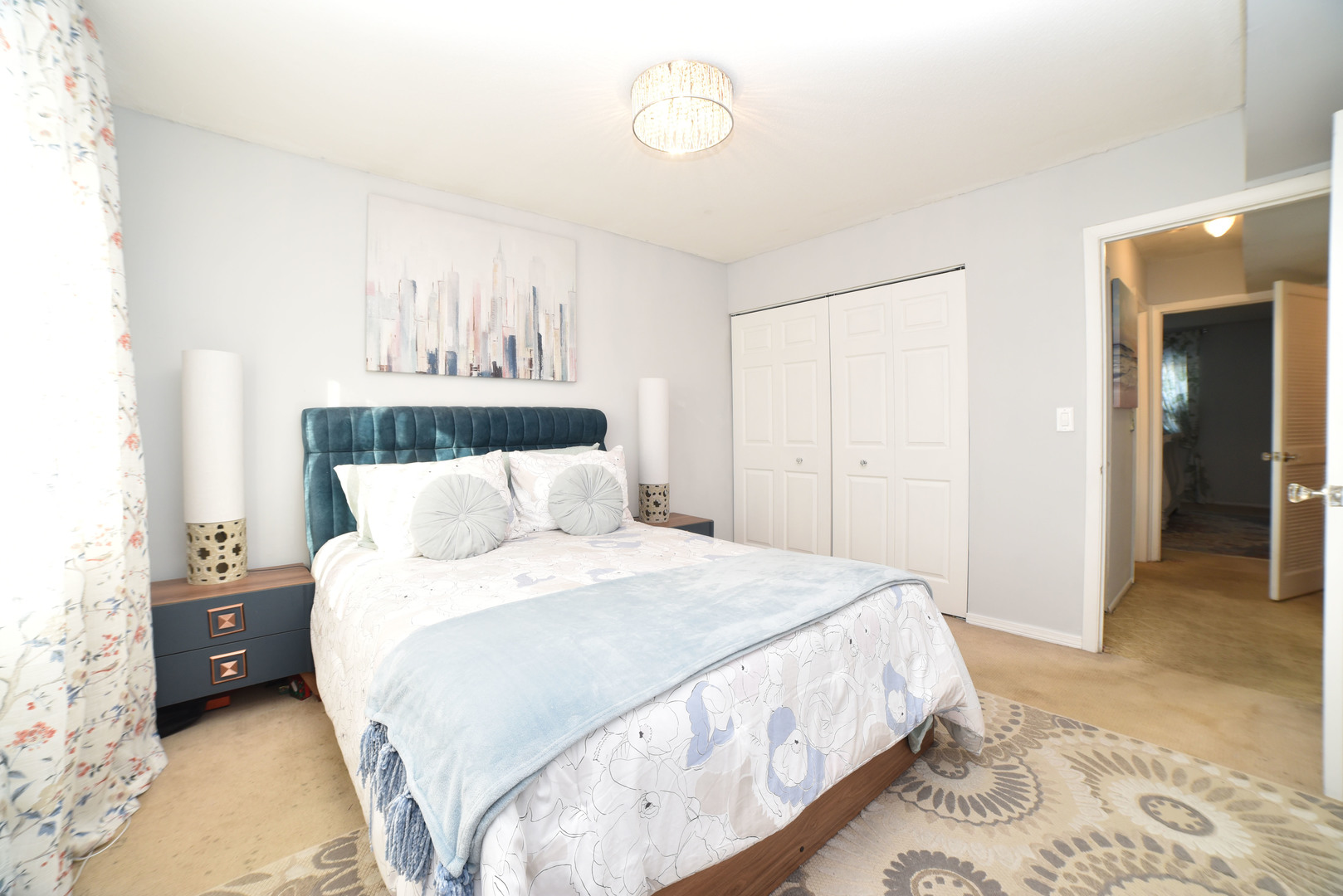 704 Cobblestone Circle, Unit 3E Glenview, IL 60025 - Photo 14 of 21 a bedroom with a bed and a mirror