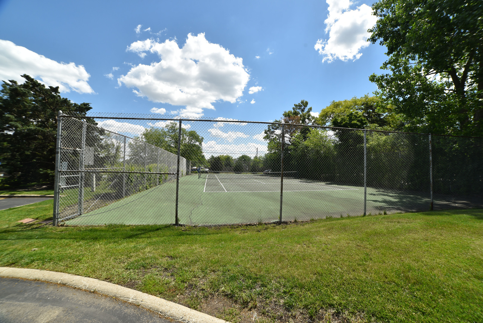 704 Cobblestone Circle, Unit 3E Glenview, IL 60025 - Photo 20 of 21 a view of a park with a slide