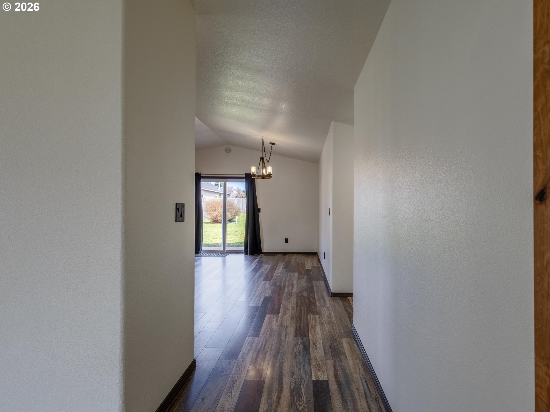 304 East Wilson Street Yacolt, WA 98675 - Photo 6 of 29 a view of a hallway with wooden floor