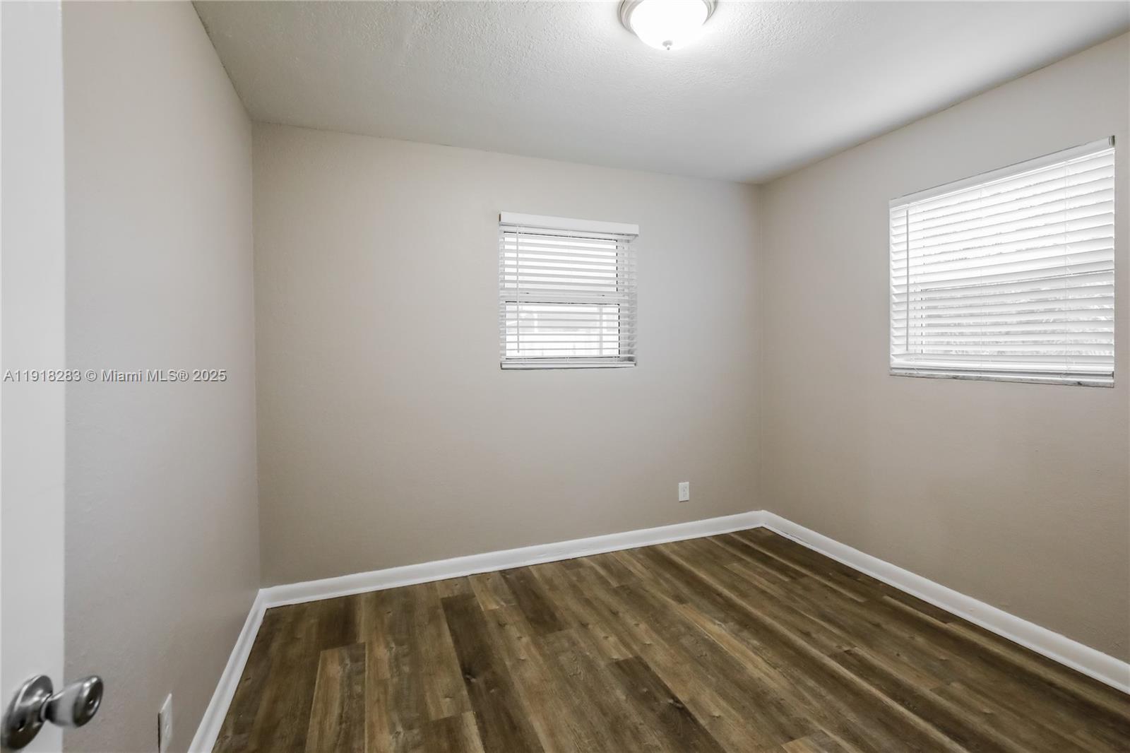 6212 Northwest 15th Court Margate, FL 33063 - Photo 13 of 16 an empty room with a window