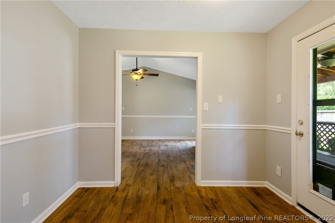 203 Cobblestone Court Raeford, NC 28376 - Photo 14 of 46 a view of walk in closet with wooden floor