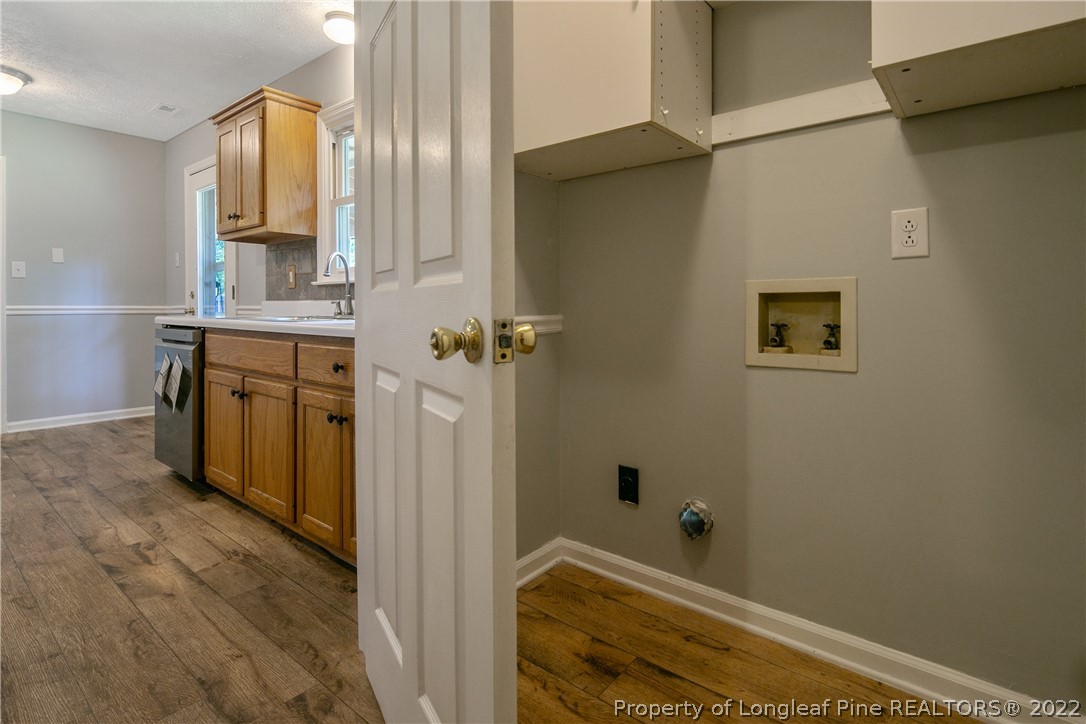 203 Cobblestone Court Raeford, NC 28376 - Photo 19 of 46 a bathroom with a sink and a mirror