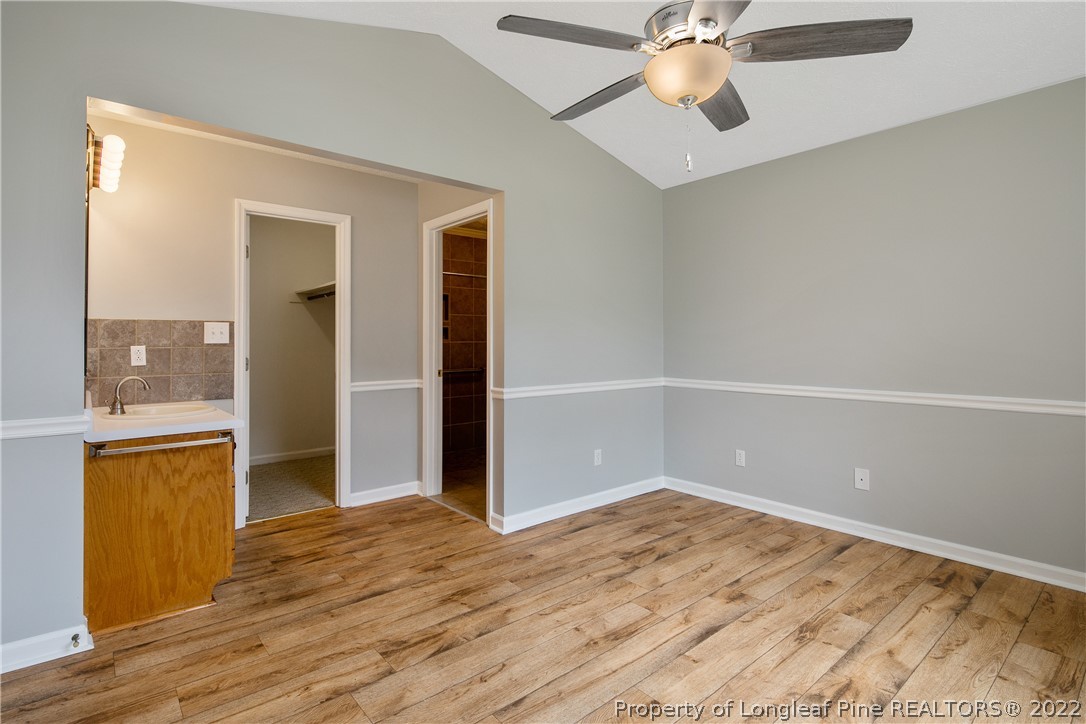 203 Cobblestone Court Raeford, NC 28376 - Photo 24 of 46 wooden floor in an empty room with a window