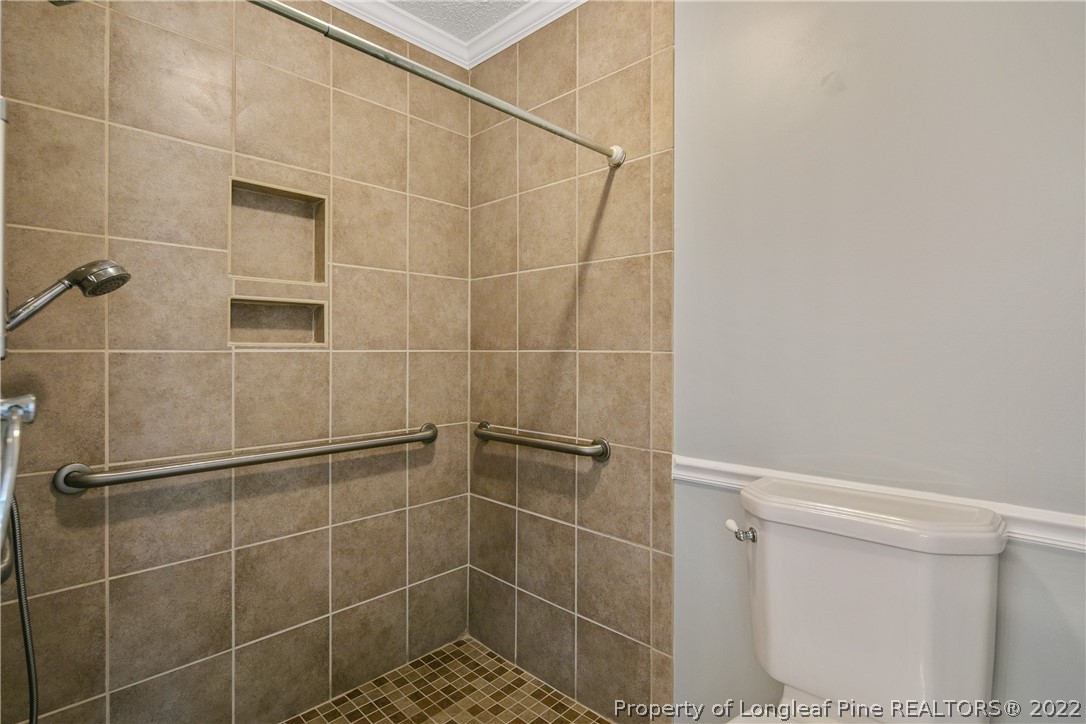 203 Cobblestone Court Raeford, NC 28376 - Photo 29 of 46 a bathroom with a shower