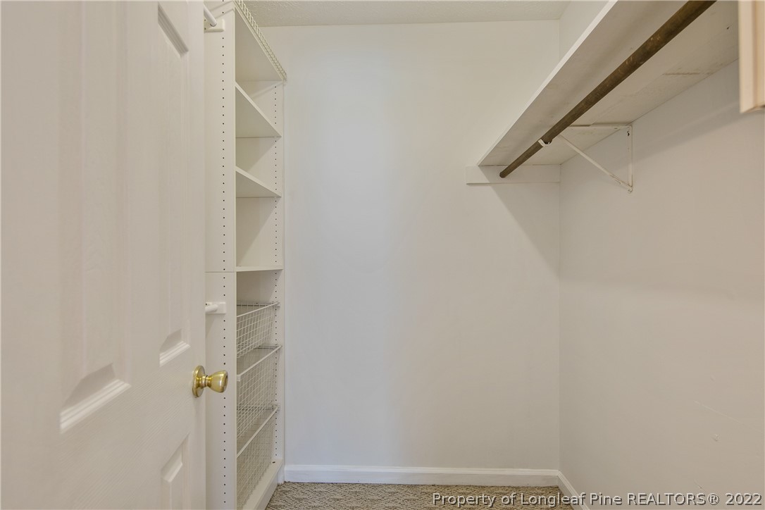 203 Cobblestone Court Raeford, NC 28376 - Photo 30 of 46 a view of staircase with white walls
