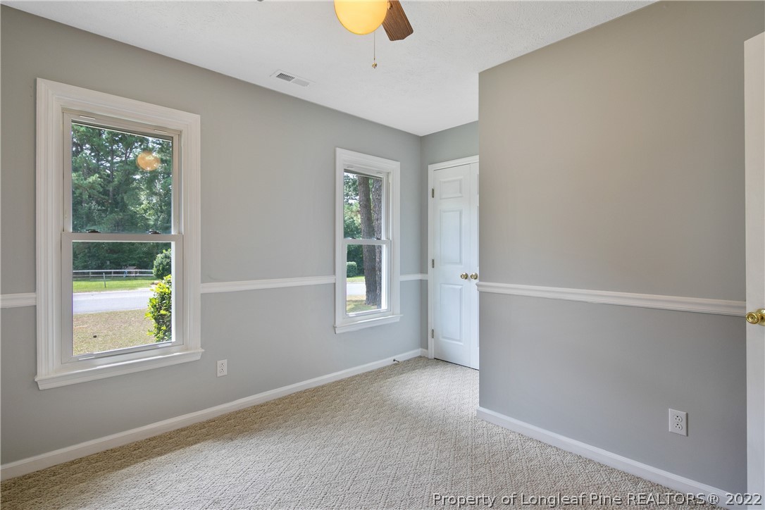203 Cobblestone Court Raeford, NC 28376 - Photo 32 of 46 an empty room with windows
