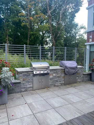 a view of backyard with seating space