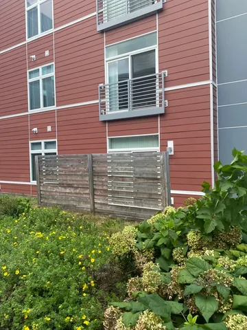 a view of front of house with a yard