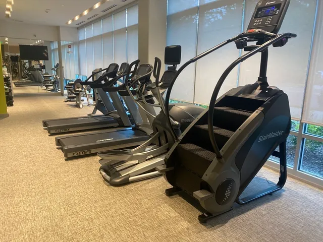 a gym room with gym equipment