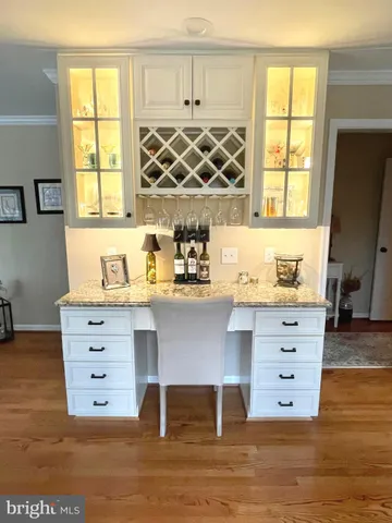 a view of cabinet with wooden floor