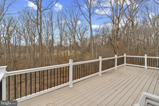 a view of road with house in background