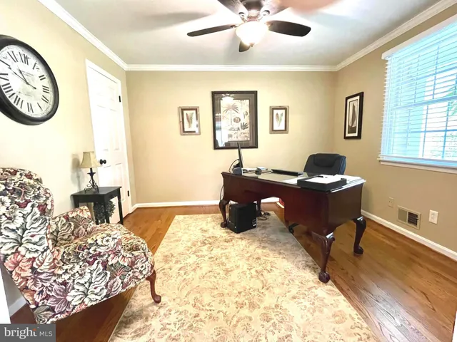 a bed room with a bed and a chandelier