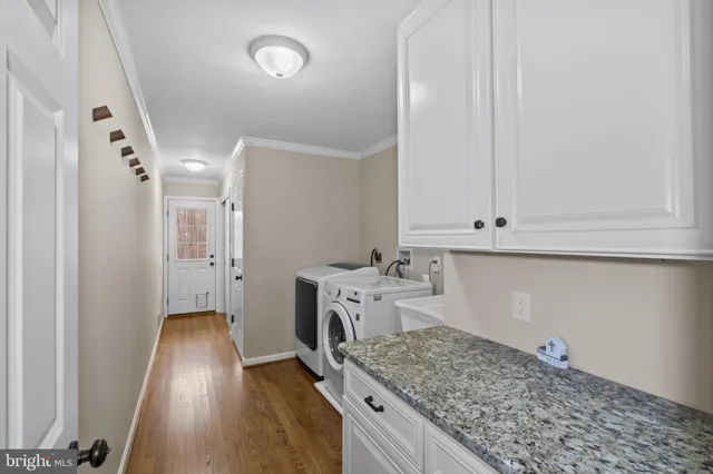 a kitchen with a refrigerator and window