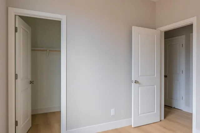 a view of front door with wooden floor