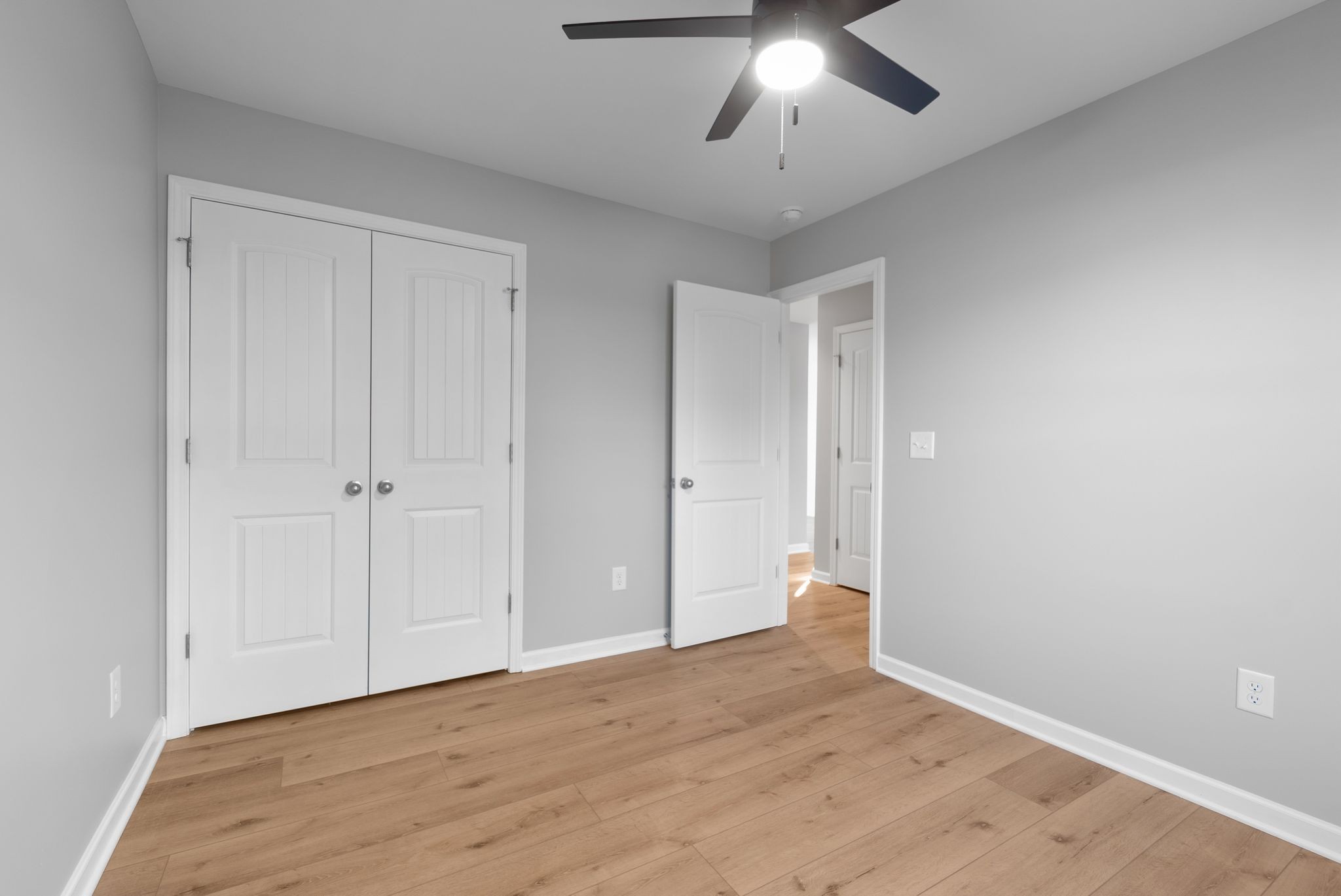 81 Dukes Park Road Summertown, TN 38483 - Photo 20 of 32 a view of an empty room and chandelier fan