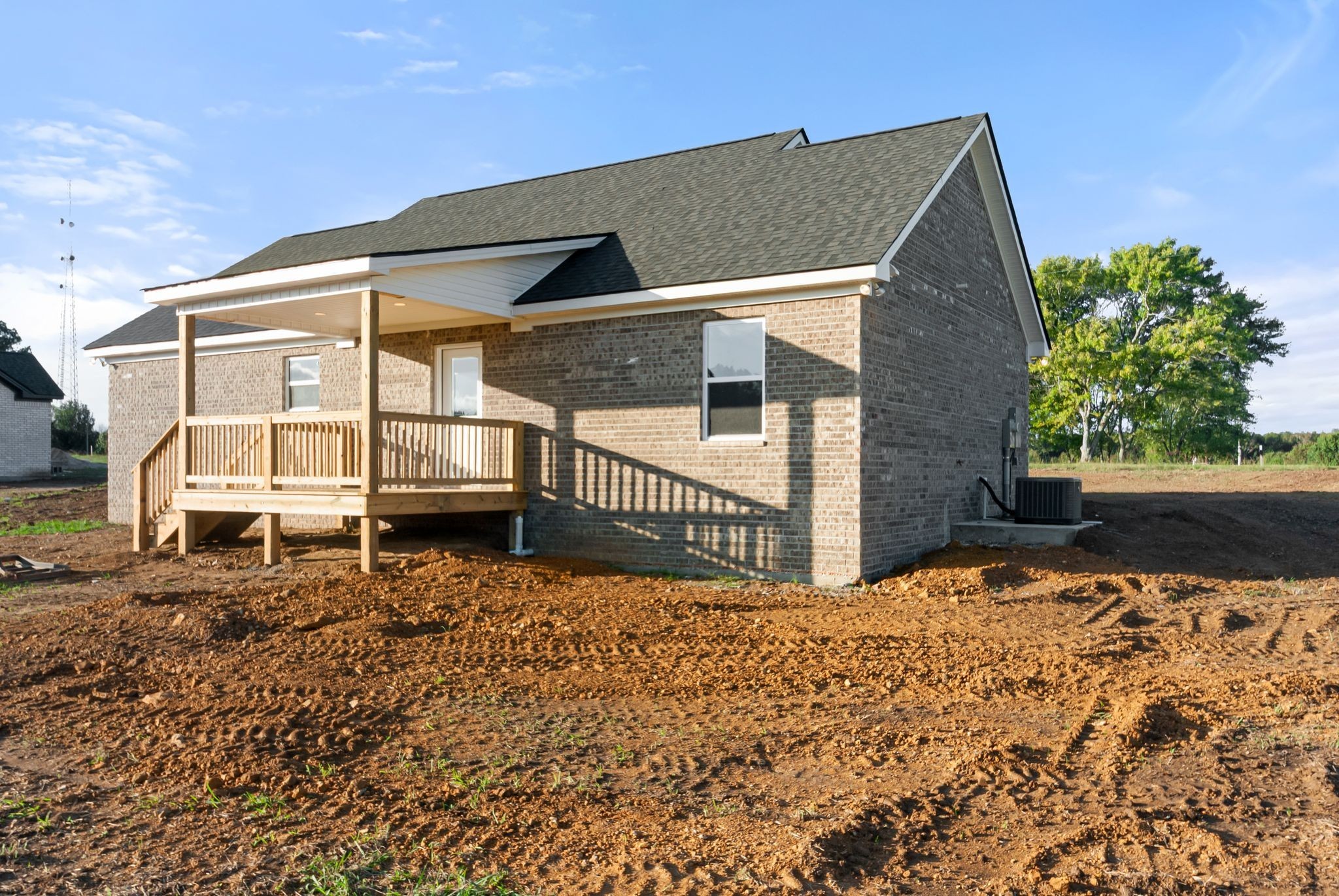 81 Dukes Park Road Summertown, TN 38483 - Photo 30 of 32 a view of a house with a small yard and wooden fence