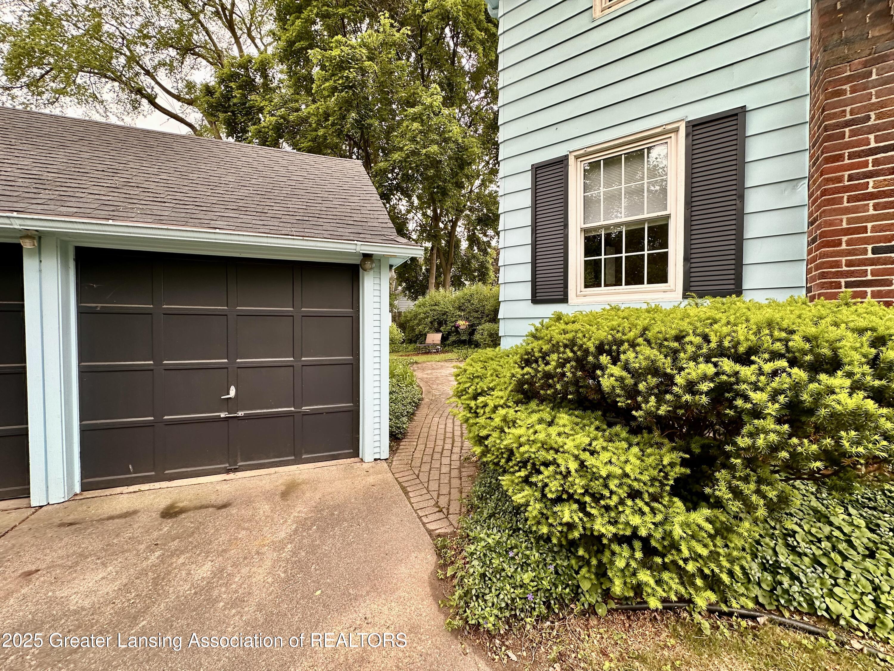 841 Huntington Road East Lansing, MI 48823 - Photo 29 of 29 841 Huntington garage/home