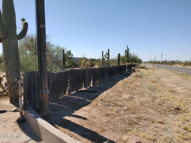 a view of a terrace with wooden fence