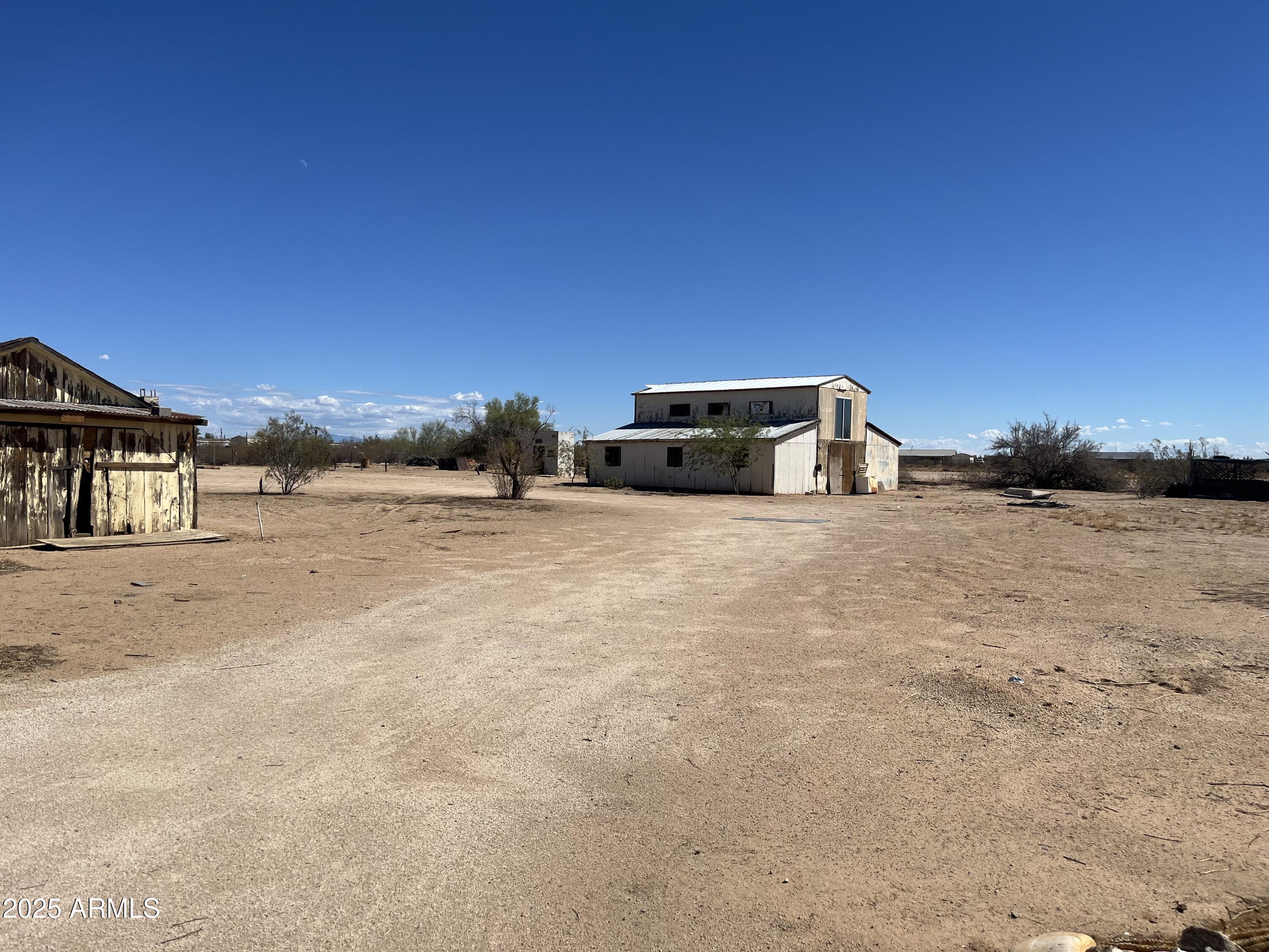 22695 East Cactus Forest Road Florence, AZ 85132 - Photo 22 of 37 a view of a house with a yard