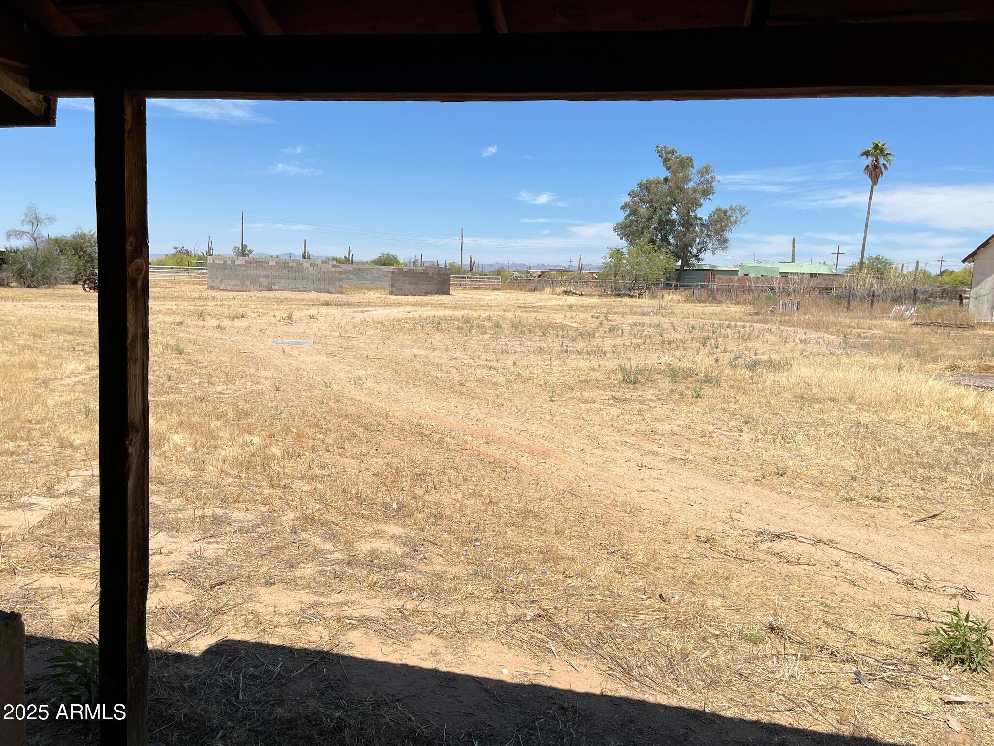 22695 East Cactus Forest Road Florence, AZ 85132 - Photo 26 of 45 a view of a room with floor to ceiling windows