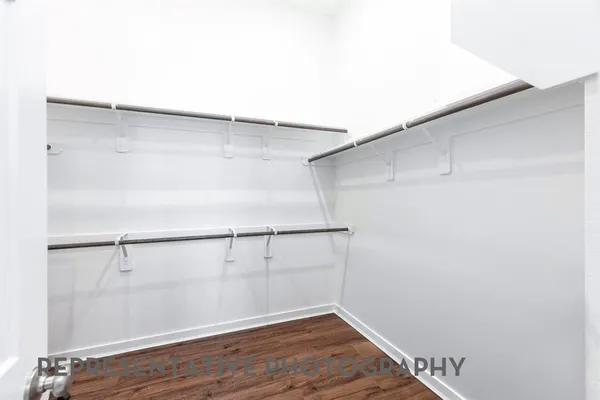 a view of an empty walk in closet