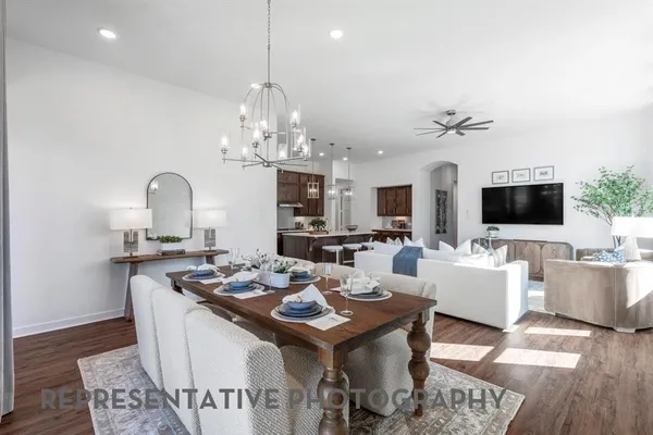 a bedroom with a bed and a mirror