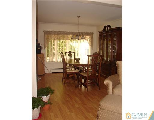 423 Monmouth Road Jackson, NJ 08527 - Photo 3 of 10 a dining room with furniture window and outside view