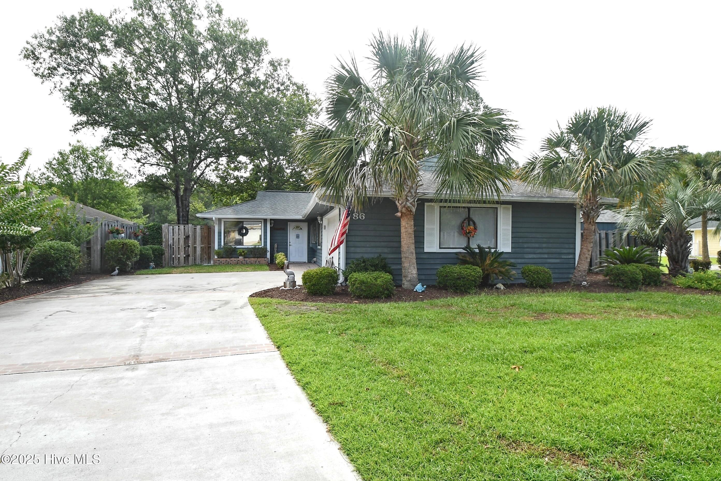 86 Cedar Tree Lane Southwest Calabash, NC 28467 - Photo 1 of 36 Front of Home
