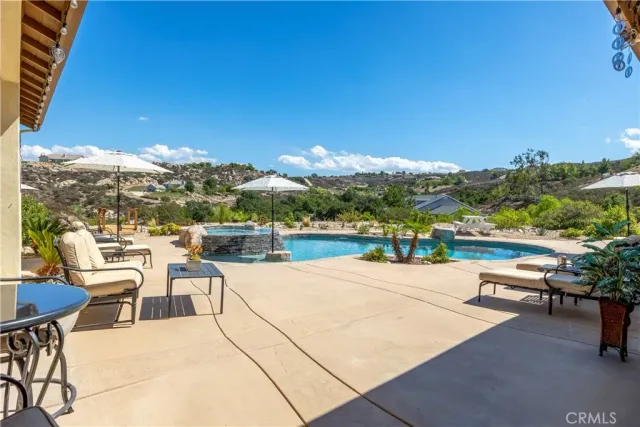 aerial view of a house with a yard