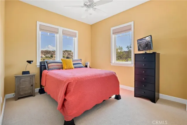 a view of a patio with couches chairs and potted plants